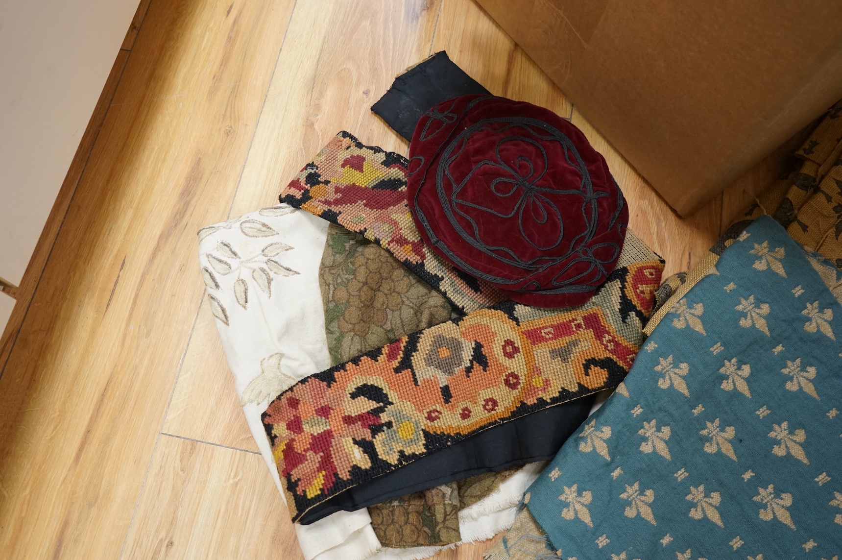 A 19th century beadwork panel and bell pull, various samples of printed textiles, a collection of corded and tasselled tie backs, etc.